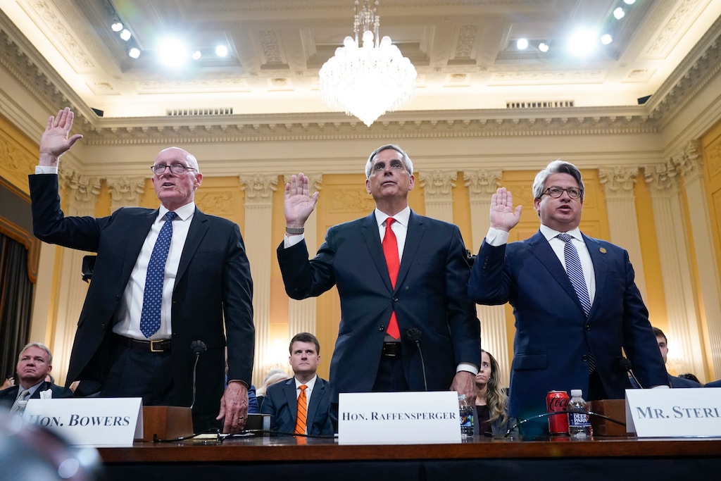 (Jacquelyn Martin | AP) Rusty Bowers, Arizona state House Speaker, from left, Brad Raffensperger, Georgia Secretary of State, and Gabe Sterling, Georgia Deputy Secretary of State, are sworn in to testify as the House select committee investigating the Jan. 6 attack on the U.S. Capitol continues to reveal its findings of a year-long investigation, at the Capitol in Washington, Tuesday, June 21, 2022.