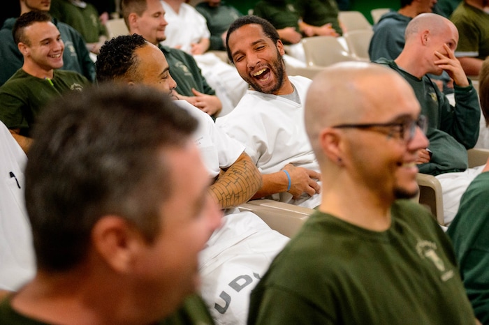 (Trent Nelson | The Salt Lake Tribune)
Inmates practice a belly laugh during a motivational talk by Bob Kittell at a meeting of the New Visions Speech Club at the Utah State Prison's Promontory facility in Draper on Tuesday Dec. 3, 2019.