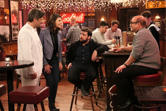 (Photo courtesy Michael Yarish/CBS) Jay R. Ferguson as Chip, Lindsey Kraft as Lesley, David Krumholtz as Rabbi Gil, and Ian Gomez as Father Gene in “Living Biblically.”