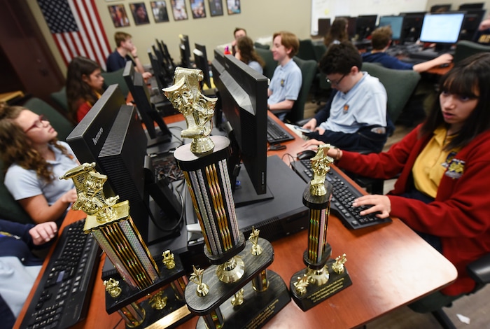 (Francisco Kjolseth  |  The Salt Lake Tribune)  Trophies for the high school shakespearean competition are on display in the computer tech room as students work on spreadsheets at the Lindon charter school Karl G. Maeser Preparatory Academy on Tuesday, May 8, 2018. For the second consecutive year the school was named Utah's best high school by U.S. News and World Report.