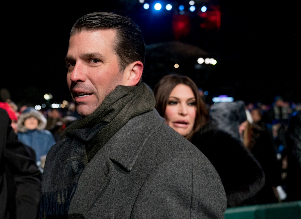 FILE - In this Nov. 28, 2018, file photo, Donald Trump Jr., center, and Kimberly Guilfoyle, right, depart following the National Christmas Tree lighting ceremony at the Ellipse near the White House in Washington. Senate investigators have evidence revealing the identities behind two mysterious phone calls that Donald Trump Jr. had with blocked numbers during the 2016 presidential campaign, just days before he met with a Russian lawyer promising dirt on Democratic candidate Hillary Clinton. According to phone records provided to Congress, Trump Jr. spoke to Howard Lorber, a New York real estate executive, and Brian France, the former chairman of NASCAR, two people familiar with the records told The Associated Press. (AP Photo/Andrew Harnik, File)