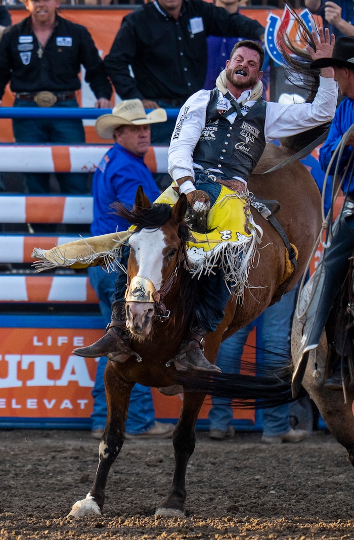 (Rick Egan | The Salt Lake Tribune) RC Landingham, from Hat Creek, Calif., competes in the bareback riding competition at the Utah Days of '47 Rodeo at the State Fairpark, on Monday, July 25, 2022.