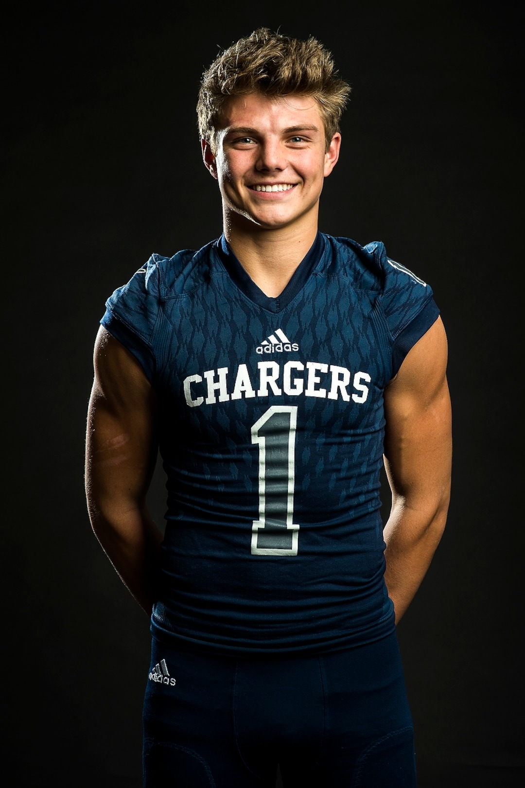 (Chris Detrick  |  The Salt Lake Tribune)  Corner Canyon quarterback Zach Wilson poses for a portrait Wednesday, December 13, 2017.  