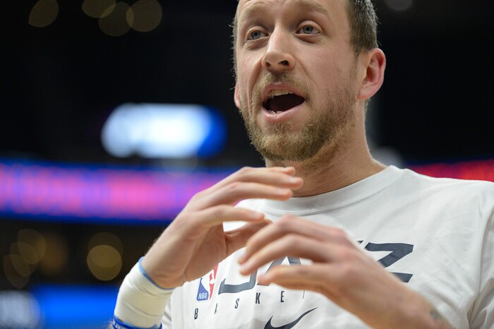 (Francisco Kjolseth  |  The Salt Lake Tribune)  Utah Jazz forward Joe Ingles (2) jokes around with a fan before the start of their game against the Oklahoma City Thunder at Vivint Smart Home Arena in Salt Lake City on Mon. Dec. 9, 2019.