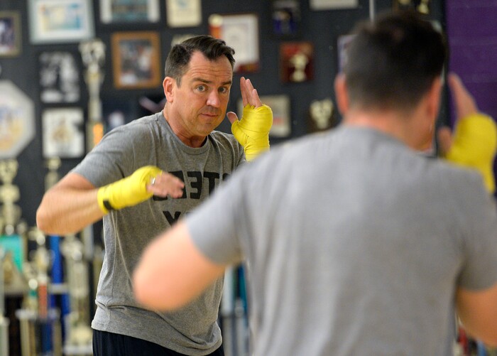 (Al Hartmann | The Salt Lake Tribune)
House Speaker Greg Hughes works on his boxing form in the mirror during a workout at the Flash Academy gym in Holladay Tuesday August 29. He's among a handful of local politicians, police and lobbyists who will box in a series of charity matches to benefit a national group that works to end domestic violence.
