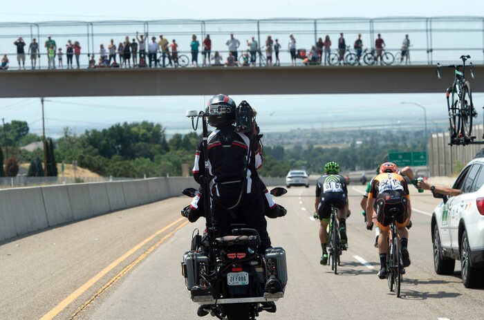 (Rick Egan  |  The Salt Lake Tribune)  Fans cheer as the leaders ride down highway 89 towards Bountiful, in the Tour of Utah, Stage 5, Friday, August 4, 2017.


