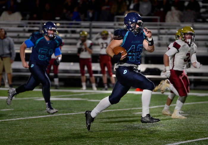 (Scott Sommerdorf   |  The Salt Lake Tribune)   Juan Diego RB Hunter Easterly sprints 44 yards for a TD to give Juan Diego a 28-12 lead. Juan Diego beat Juab 33-28, Friday, October 6, 2017. 
