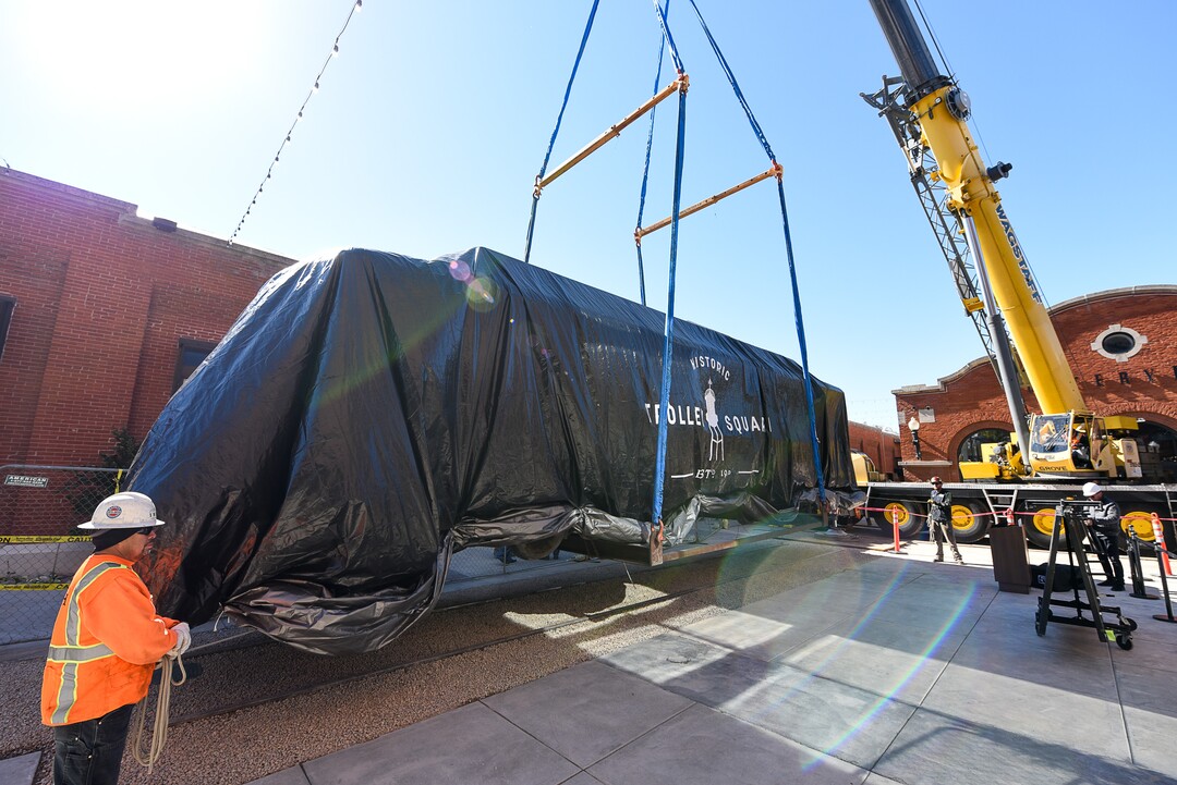 (Francisco Kjolseth  |  The Salt Lake Tribune)  The iconic trolley car, that has been sitting in storage for several years, is moved back into view at Trolley Square on Monday, Oct. 15, 2018. The empty trolley car, last seen housing the Trolley Wing Company was moved into place on the north plaza by Pottery Barn.