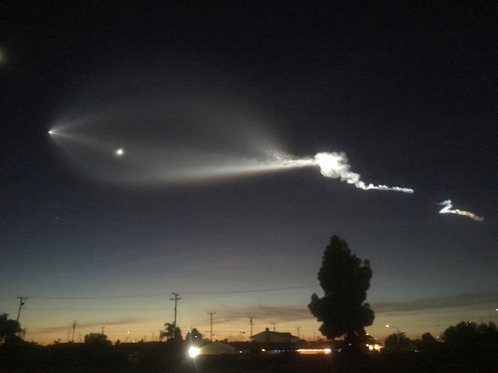 In this photo provided by Javier Mendoza, the contrail from a SpaceX Falcon 9 rocket is seen from Long Beach, Calif., more than 100 miles southeast from its launch site Vandenberg Air Force Base, Calif., on Friday, Dec. 22, 2017. A reused SpaceX rocket has carried 10 satellites into orbit from California, leaving behind it a trail of mystery and wonder as it soared into space. The Falcon 9 booster lifted off from coastal Vandenberg Air Force Base, carrying the latest batch of satellites for Iridium Communications. (Javier Mendoza via AP)