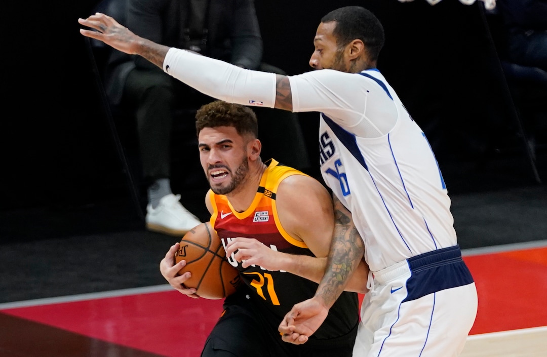 (Rick Egan | The Salt Lake Tribune)  Utah Jazz forward Georges Niang (31) goes up for a shot as Dallas Mavericks forward James Johnson (16) defends, in NBA action between the Utah Jazz and the Dallas Mavericks at Vivint Arena, on Friday, Jan. 29, 2021.