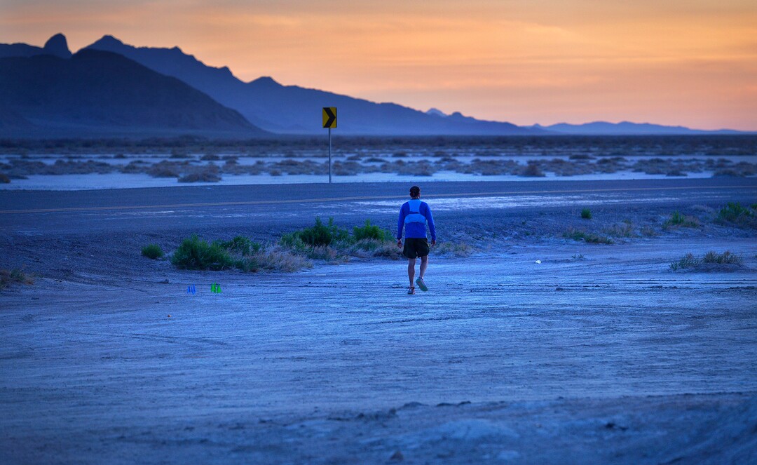 (Scott Sommerdorf | The Salt Lake Tribune)Alex Doolan sets out on the last 3.8 miles as the sun rises at the Salt Flats 100 Endurance Run, Saturday, May 5, 2018. Doolan finished the race in 8th place.