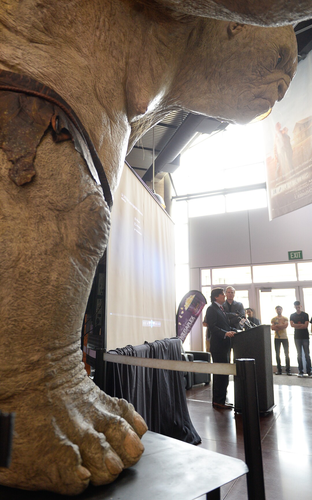 (Francisco Kjolseth  |  The Salt Lake Tribune) Trolls from the latest release of the Hobbit act as a backdrop for the date announcement of FanX by Bryan Brandenburg and Dan Farr, co-founders of the Salt Lake Comic Con. Cosplayer fans were on hand for the Jan. 29-31 2015 the press announcement at the Megaplex 17 at Jordan Common in Sandy on Wednesday, Nov. 19, 2014.
