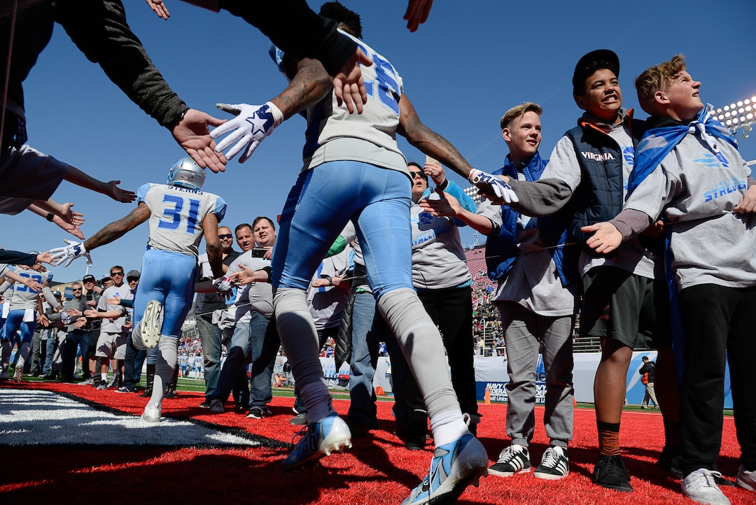 (Francisco Kjolseth  |  The Salt Lake Tribune)  Fans line up to cheer on the Salt Lake Stallions as they take to the field for the second half as they host the Memphis Express of the Alliance of American Football in Salt Lake City on Saturday March 16, 2019.