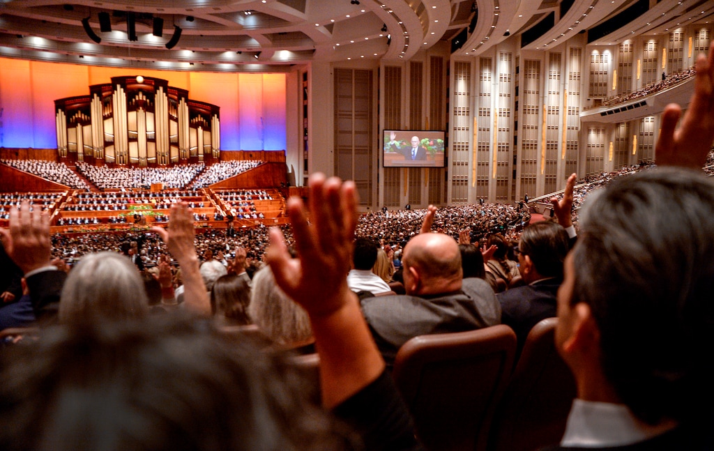 (Leah Hogsten  |  The Salt Lake Tribune) Latter-day Saints offer their sustaining vote to the church's leadership in April 2019.