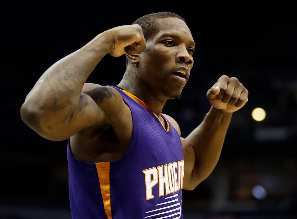 Phoenix Suns' Eric Bledsoe reacts after making a basket and being fouled during the second half of an NBA basketball game against the Milwaukee Bucks Tuesday, Jan. 6, 2015, in Milwaukee. The Suns won 102-96. (AP Photo/Morry Gash)