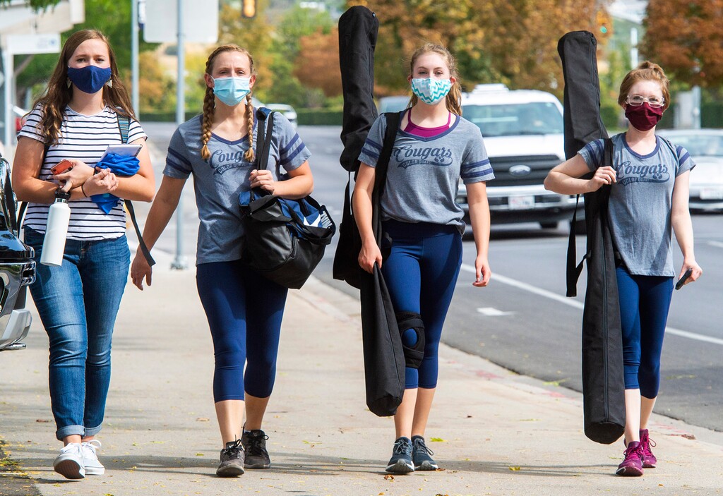 (Rick Egan  |  The Salt Lake Tribune)    Students wear masks as they walk on BYU campus in Provo, on Tuesday, Sept. 22, 2020.