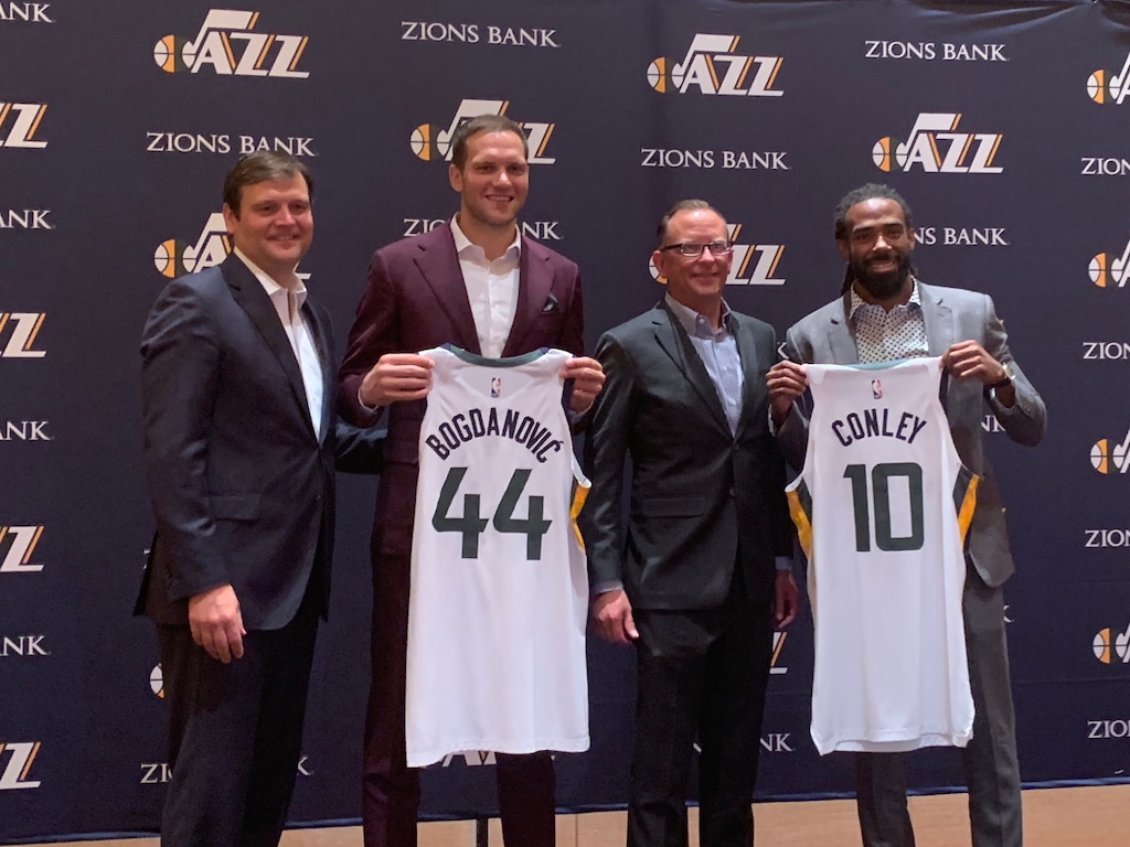(Eric Walden | The Salt Lake Tribune) Dennis Lindsey, Bojan Bogdanovic, Justin Zanik, and Mike Conley show off the players' new Jazz jerseys following a news conference to introduce them on Monday, July 8, 2019, in Las Vegas.