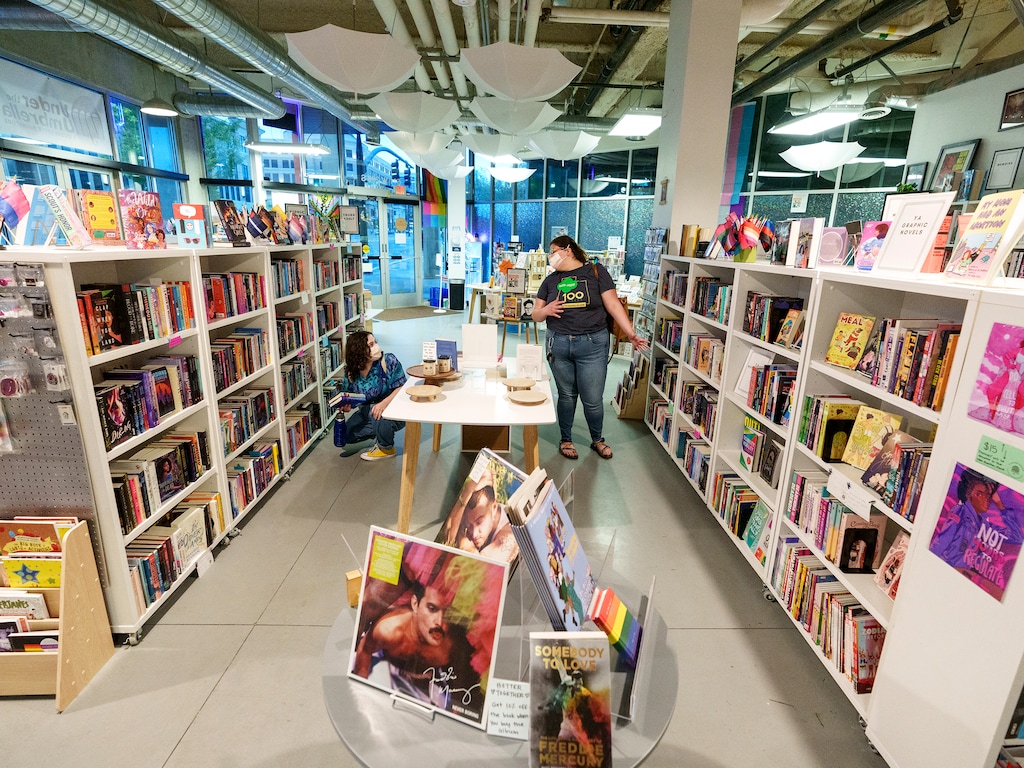 (Leah Hogsten | The Salt Lake Tribune) Destinee Montoya, left, and Kori Anne Lucero shop at Under the Umbrella book store, Saturday, April 30, 2022. Under the Umbrella bookstore stocks books that is either queer in content and/or written by queer authors, with a focus on small presses and self-published queer authors not found in general bookstores.