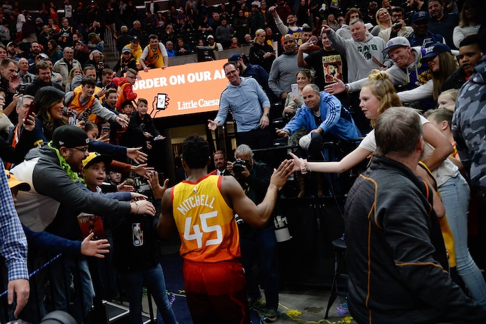 (Francisco Kjolseth  |  The Salt Lake Tribune)  Utah Jazz guard Donovan Mitchell (45) celebrates his team's 100-94 win over the Piston's in their NBA game at Vivint Smart Home Arena Monday, Jan. 14, 2019, in Salt Lake City.