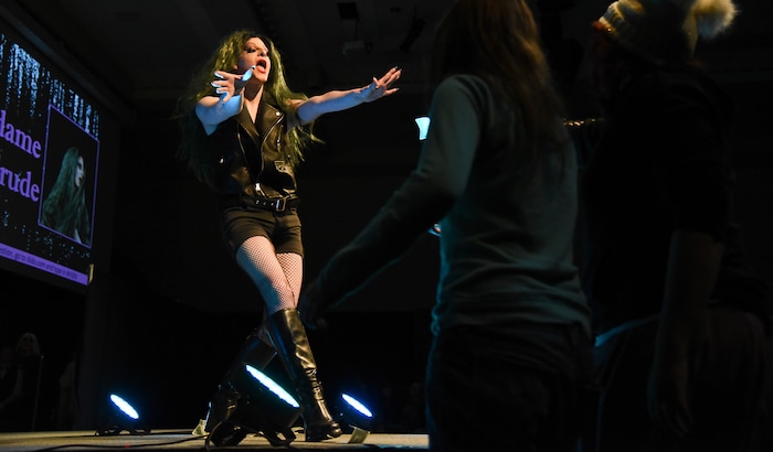 (Francisco Kjolseth  |  The Salt Lake Tribune)  Bryson LaBar, a theater student at Utah State University entertains a large crowd gathered at the Taggart Student Center ballroom as Madame LaCrude recently. USU hosted their first ever drag show recently as ten drag queens and kings put on spirited and creative performances. 