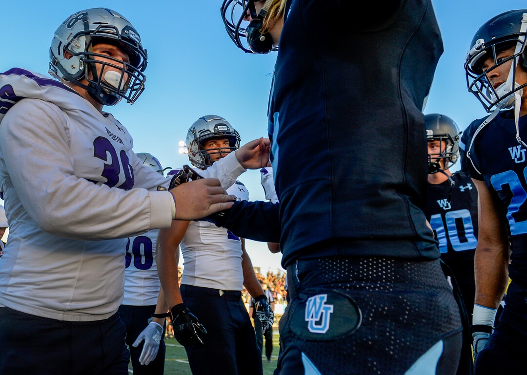 Leah Hogsten  |  The Salt Lake Tribune  Riverton High School Nate Hamblin greets West Jordan High School Kalleb Klenk prior to their game, Thursday, Sept. 13, 2018 in West Jordan. 