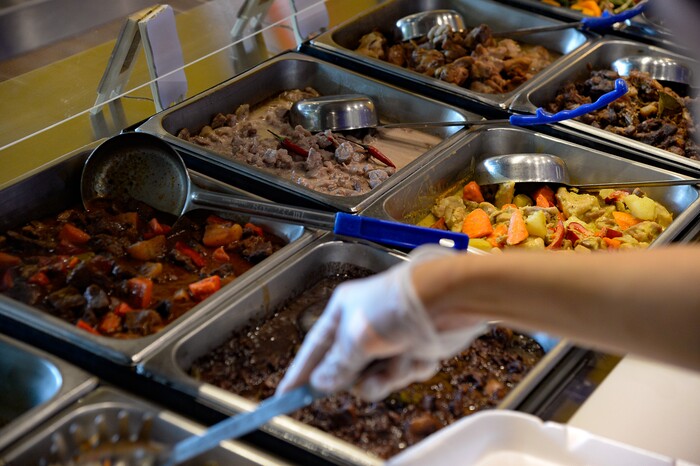 (Francisco Kjolseth  |  The Salt Lake Tribune)  BFF Turon, a new Filipino restaurant in West Jordan serves up turo-turo or cafeteria style food as Arlene Orani prepares a lunch special during a recent lunch hour.