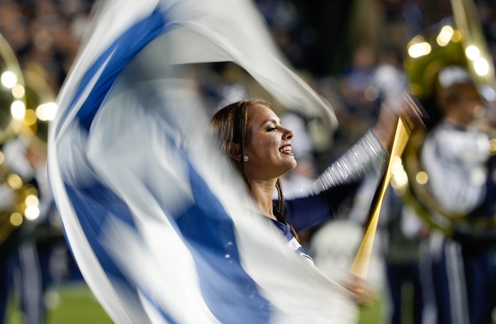 (Francisco Kjolseth | The Salt Lake Tribune) Members of the BYU Color Guard get the fans cheering before the start of game as the Brigham Young Cougars take on the South Florida Bulls at LaVell Edwards Stadium in Provo, Saturday, Sept. 25, 2021.