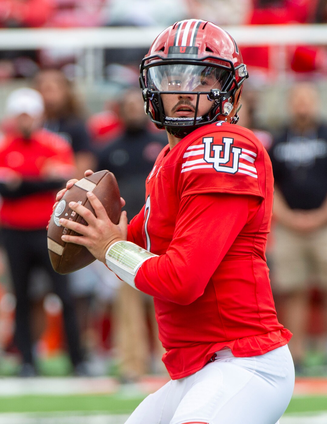 (Rick Egan  |  The Salt Lake Tribune)  Quarterback Cameron Rising looks for a receiver, in Utah's spring Red-White game at Rice-Eccles Stadium, Saturday, April 13, 2019.