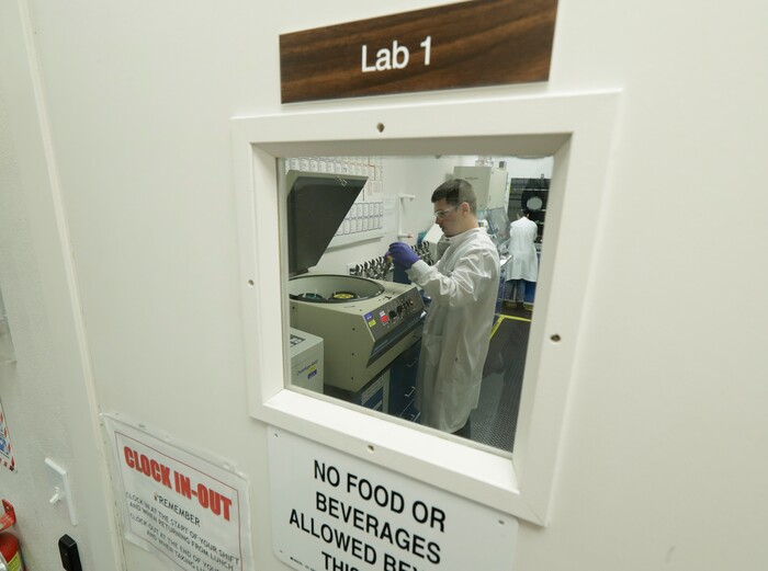 (Ted Warren | AP file photo) Researchers work at Flora Research Laboratories in Grants Pass, Ore., on July 18, 2019. The Associated Press commissioned the lab to test vape products as part of an investigation that shows a dark side to the booming industry selling the cannabis extract CBD. The lab tested 30 vape products sold around the country as CBD that AP chose by targeting brands that law enforcement authorities or users flagged as suspect. Ten of the 30 samples contained synthetic marijuana, a street drug commonly known as K2 or spice.