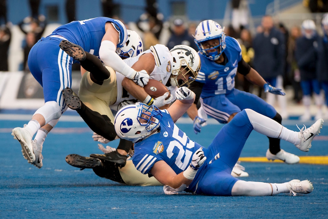 (Jeremy Harmon  |  The Salt Lake Tribune) Western Michigan Broncos running back Chase Brown (28) gets tackled as BYU faces the Western Michigan Broncos in the Famous Idaho Potato Bowl in Boise, Idaho, on Friday, Dec. 21, 2018.
