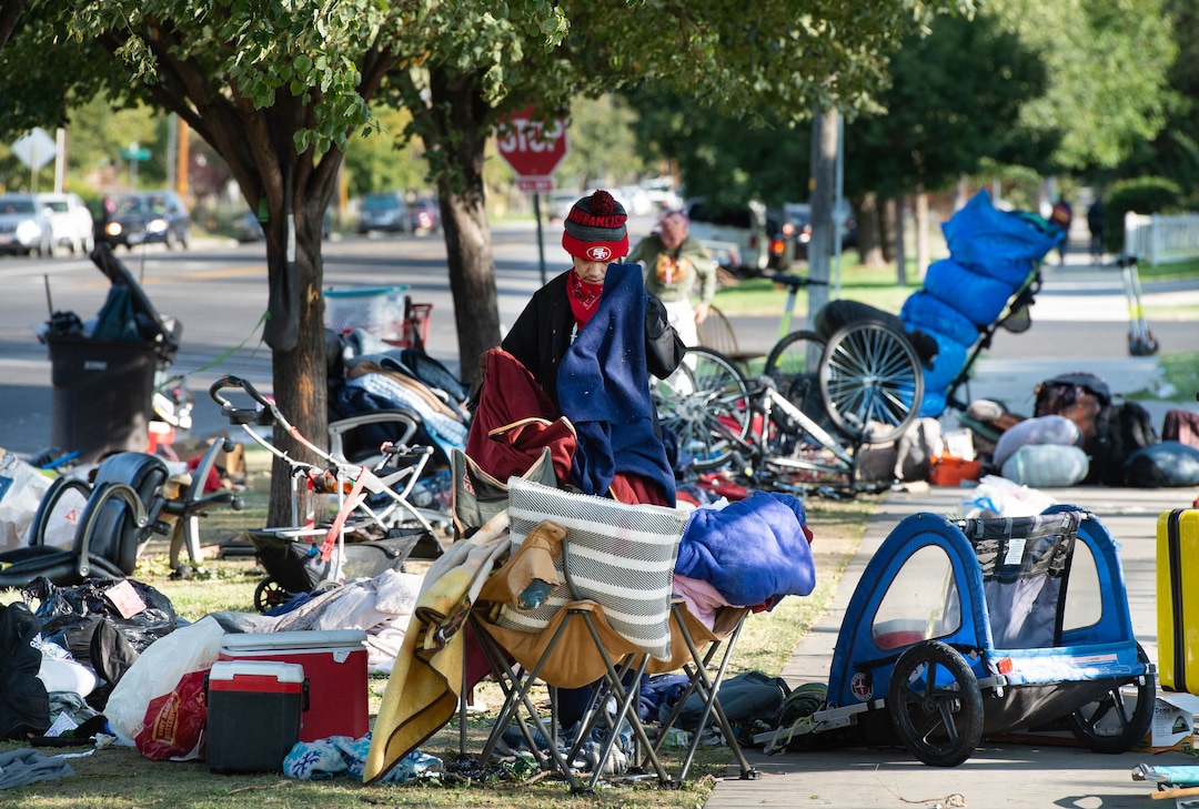 (Francisco Kjolseth  |  The Salt Lake Tribune) People are forced to pack up their camp outside of Liberty-Wells Recreation Center in downtown Salt Lake City on Thursday, Sept. 10, 2020, after being notified by the health department the day before.