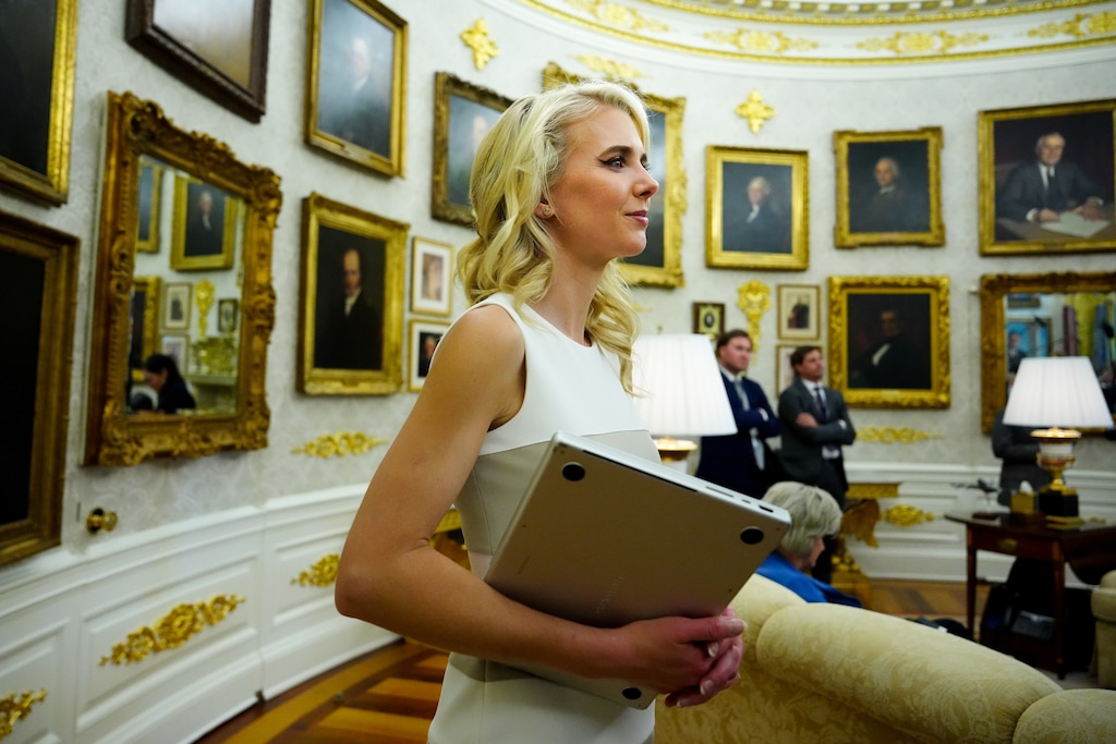 White House aide Natalie Harp listens as President Donald Trump speaks in the Oval Office of the White House, Thursday, June 4, 2026, in Washington. (AP Photo/Julia Demaree Nikhinson)