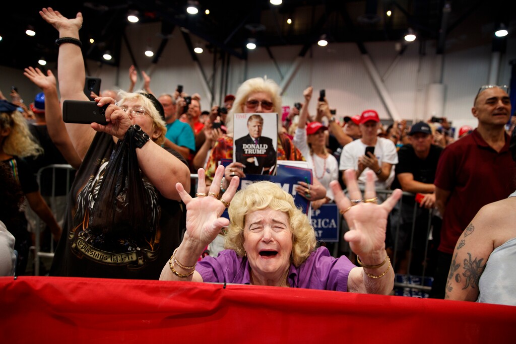 Supporters of President Donald Trump cheer as he speaks during a campaign rally, Thursday, Sept. 20, 2018, in Las Vegas. (AP Photo/Evan Vucci)