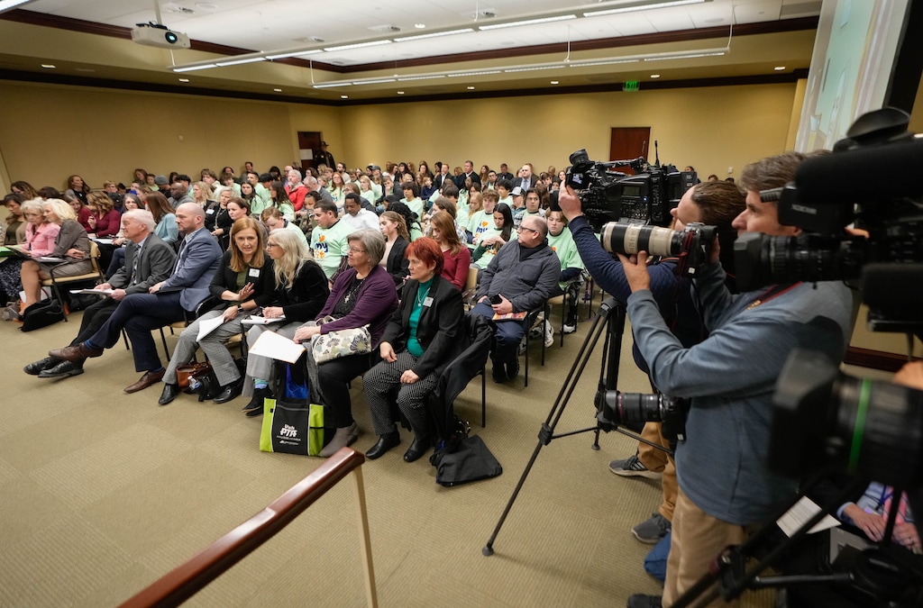 (Francisco Kjolseth | The Salt Lake Tribune) Members of the public and news media listen to a committee hearing in 2023 as Rep. Candice Pierucci, R-Riverton, the sponsor of HB215, which established the Utah Fits All education voucher program, speaks on the bill.