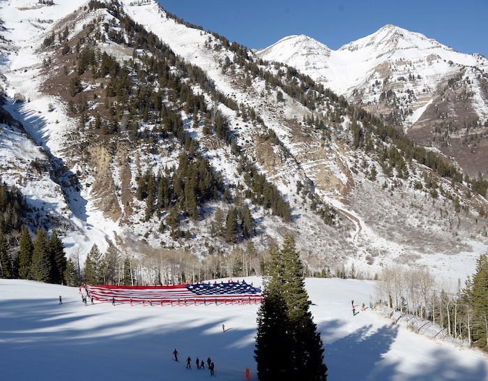 (Al Hartmann  |  The Salt Lake Tribune) 	Sundance Mountain Resort partnered with Follow the Flag to ski a giant American Flag down Bearclaw run. The flag is 78' x 150' and weighs more than 400 pounds, the largest free-flying American flag in the world. It took coordination of 50 of Sundance's best skiers to pull it off.  This event is to express patriotism and support of Team USA and athletes representing the country in the upcoming Winter Olympics in Pyeongchang, South Korea. 