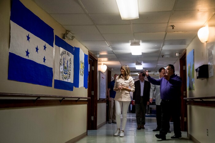 First lady Melania Trump, left, and Health and Human Services Secretary Alex Azar, second from left, take a tour of the Upbring New Hope Children Center run by the Lutheran Social Services of the South in McAllen, Texas, Thursday, June 21, 2018. (AP Photo/Andrew Harnik)