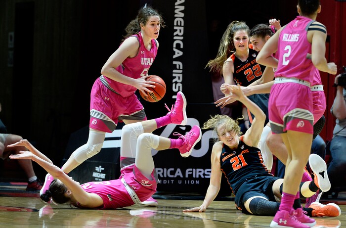 Scott Sommerdorf | The Salt Lake TribuneThe second half got a little rough as players fall to the floor around Utah Utes center Megan Huff (5) during second half play. Oregon State defeated Utah 69-58, Friday, January 26, 2018.