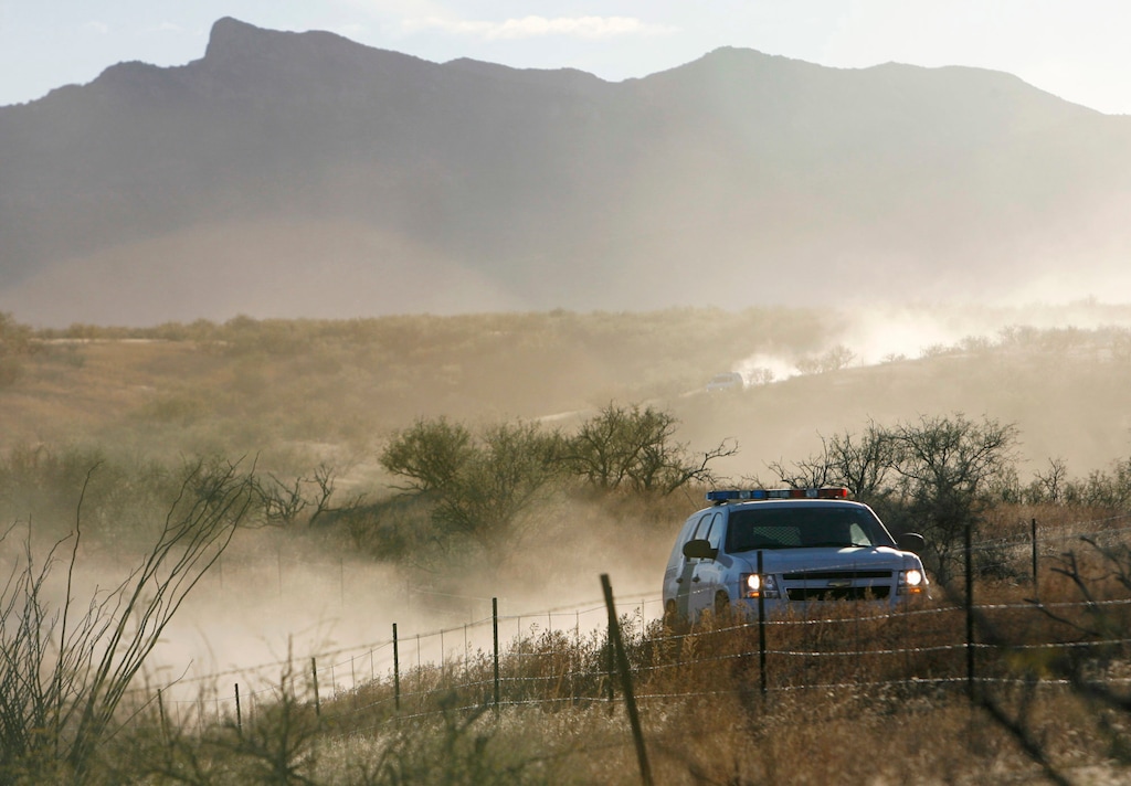 (Greg Bryan | Arizona Daily Star | The Associated Press) In this Dec. 15, 2010, file photo, a U.S. Border Patrol vehicle returns from the scene of an overnight shootout where Border Patrol Agent Brian Terry was killed northwest of Nogales, Ariz. A man extradited to the U.S. from Mexico has pleaded not guilty to charges of pulling the trigger in Terry's slaying. Court records show Heraclio Osorio-Arellanes entered his plea during a Wednesday, Aug. 1, 2018, arraignment in U.S. District Court in Tucson.