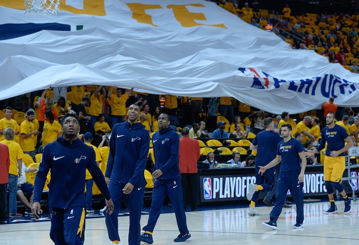 (Francisco Kjolseth | The Salt Lake Tribune) Fans pull the Utah Jazz flag before the start of their game against the Houston Rockets in Game 4 of the NBA playoffs at the Vivint Smart Home Arena Sunday, May 6, 2018 in Salt Lake City.