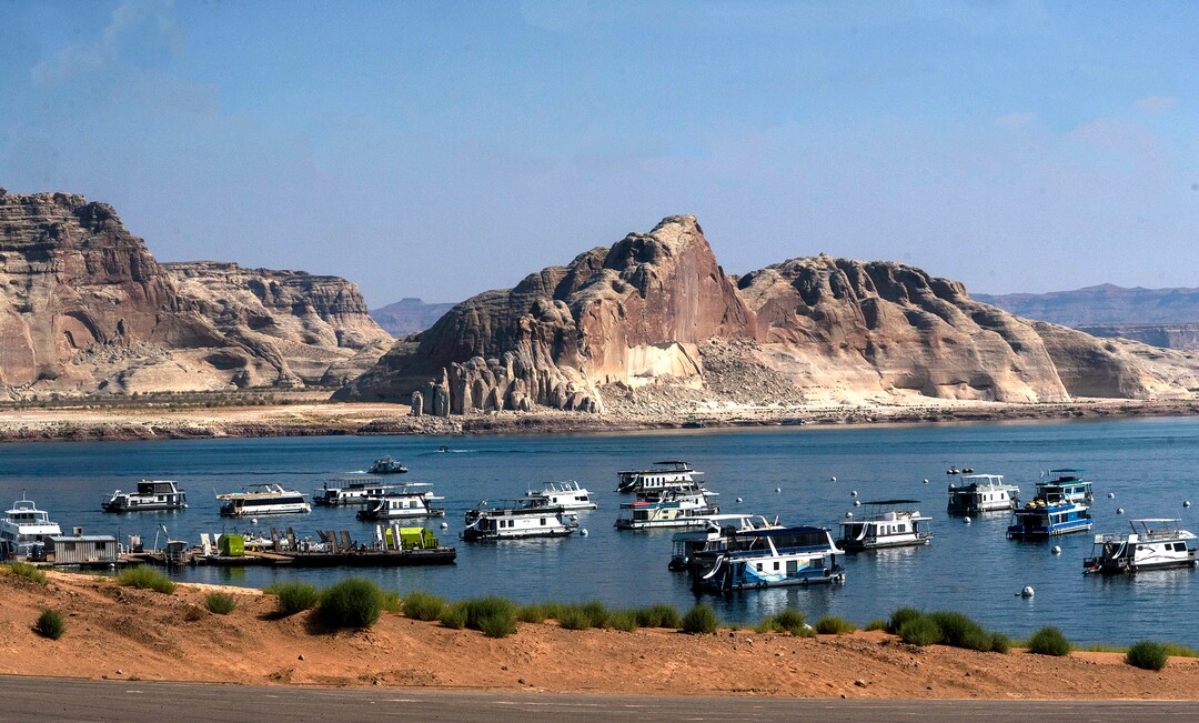 (Rick Egan | The Salt Lake Tribune)  House boats at Lake Powell, on Tuesday, Aug. 3, 2021.