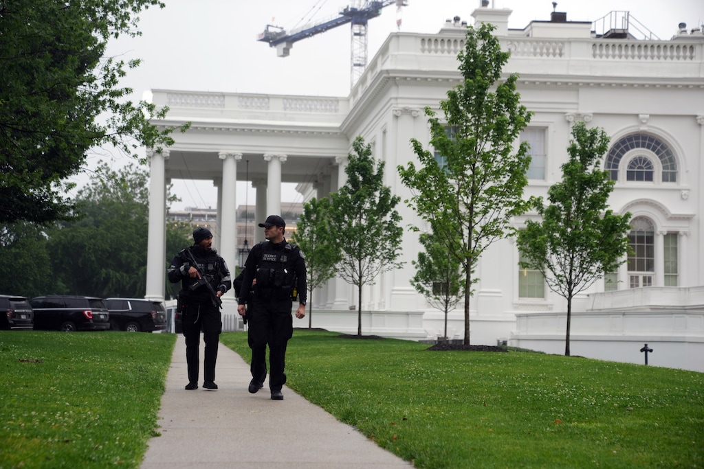 (Allison Robbert | The New York Times) Security at the White House after a nearby shooting on Saturday, May 23, 2026. A man took a gun out of a bag and fired a volley of shots near the White House on Saturday evening before being shot and fatally wounded by U.S. Secret Service officers, the Secret Service said in a statement.