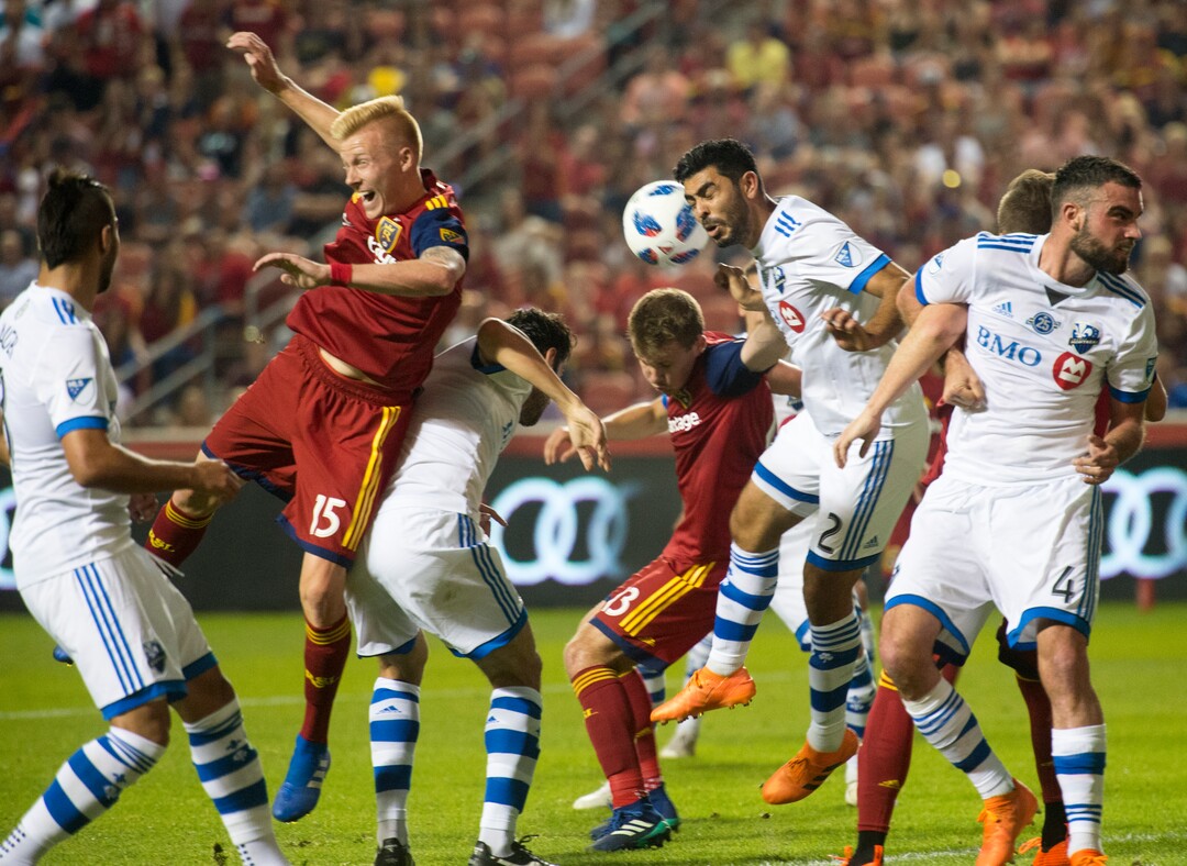 (Rick Egan  |  The Salt Lake Tribune)     Real Salt Lake defender Justen Glad (15) and Real Salt Lake midfielder Nick Besler (13)fight for position on a corner-kick, in MLS action between Real Salt Lake and Montreal Impact, at Rio Tinto Stadium in Sandy, Saturday, Aug. 11, 2018.
