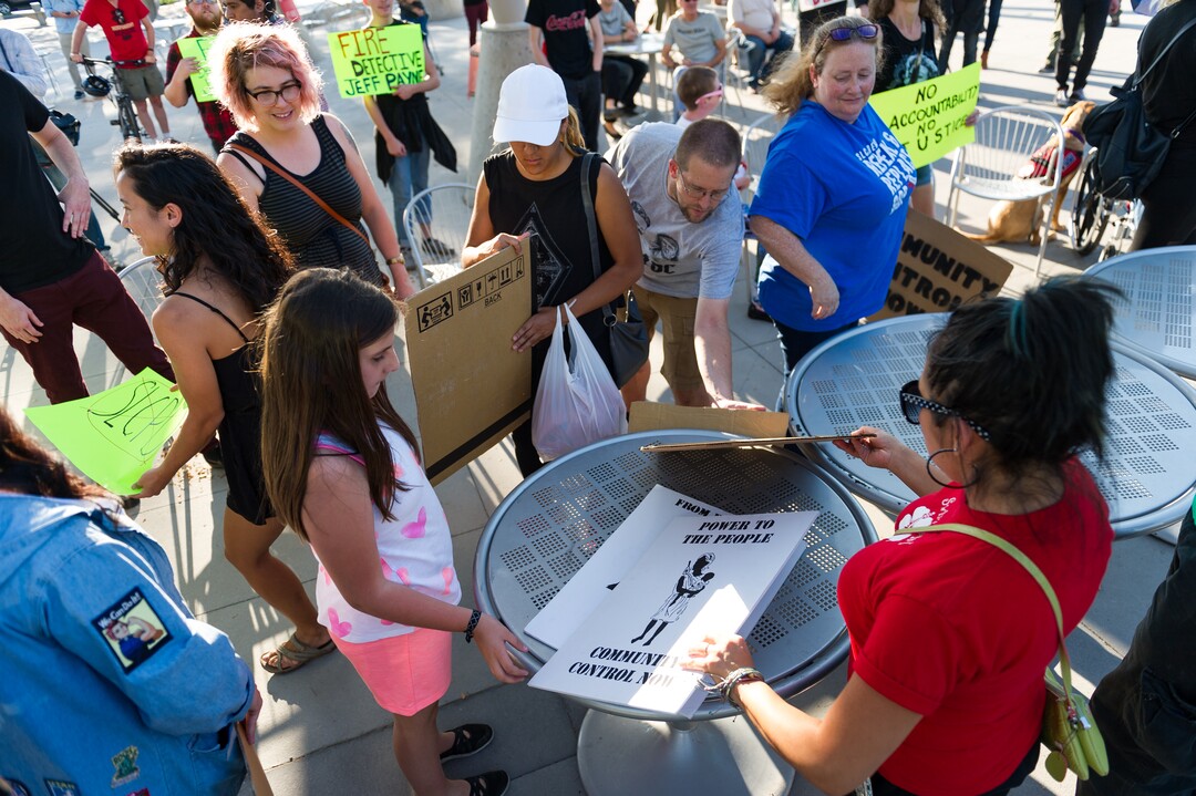 (Alex Gallivan | Special to the Tribune) People protest at an Emergency Rally hosted by Utah Against Police Brutality, in response to the arrest of U of U nurse Alex Wubbels. Wubbels was arrested by SLCPD Detective Jeff Payne after she refused to take blood from an unconscious patient, which is against hospital policy.