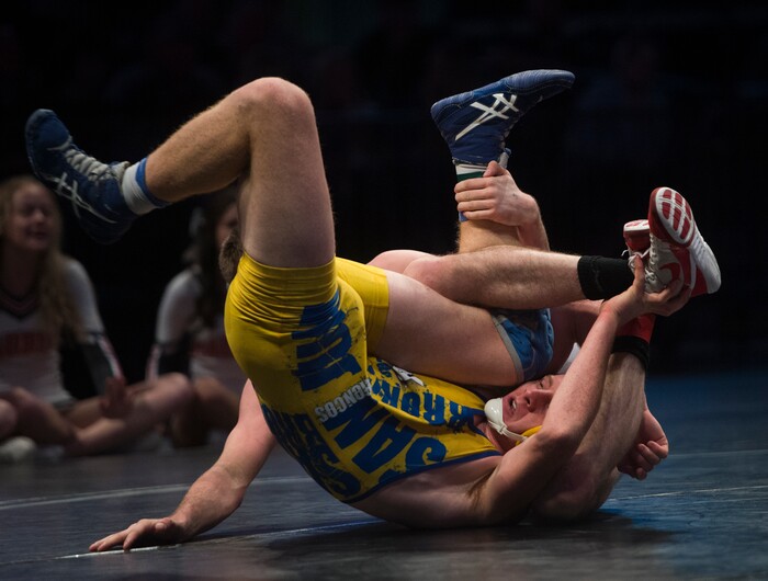 (Rick Egan  |  The Salt Lake Tribune)   Tanner Shields (Delta) wrestles Grange Simpson (San Juan) in the 170 weight class, in the 4A State Wrestling Championships at UVU in Orem, Saturday, February 10, 2018.