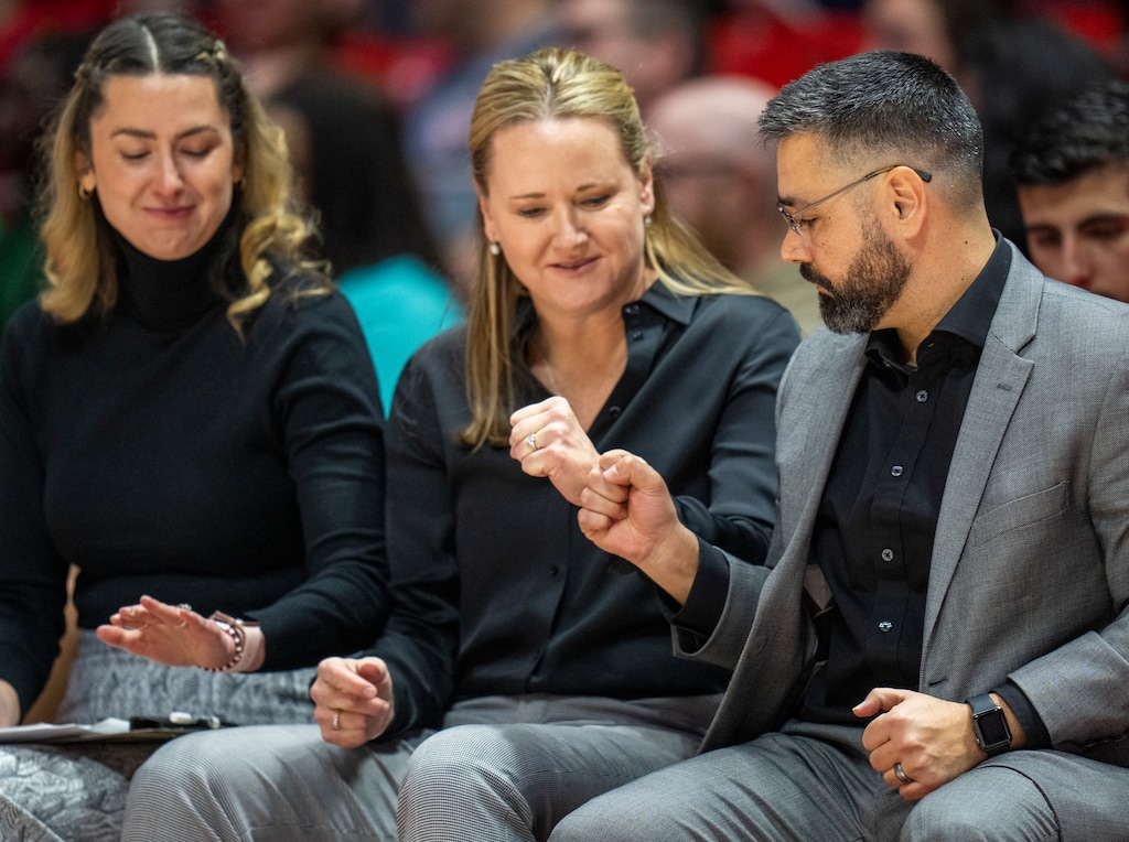 (Rick Egan | The Salt Lake Tribune) Utah head coach Lynne Roberts, talks to Utah guard Gianna Kneepkens (5), in PAC-12 women's basketball action between Utah Utes and California Golden Bears, at the Jon M. Jon M. Huntsman Center, Thursday, February. 23, 2022.