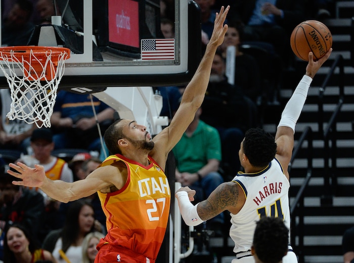 (Francisco Kjolseth  |  The Salt Lake Tribune)  Utah Jazz center Rudy Gobert (27) defends Denver Nuggets guard Gary Harris (14) as the Utah Jazz host the Denver Nuggets in their NBA game at Vivint Smart Home Arena Tuesday, April 9, 2019, in Salt Lake City.
