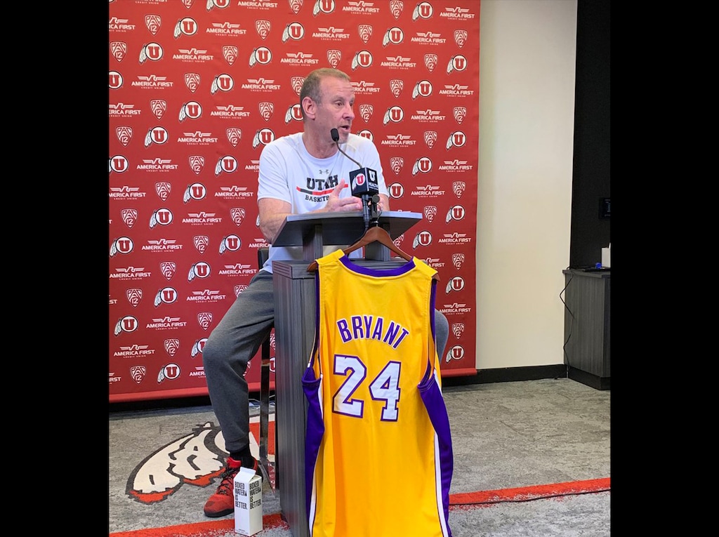 (Josh Newman | The Salt Lake Tribune) Utah men’s basketball head coach Larry Krystkowiak conducts a press conference with the jersey of Kobe Bryant hanging from the podium, Jan. 28. 2020.
