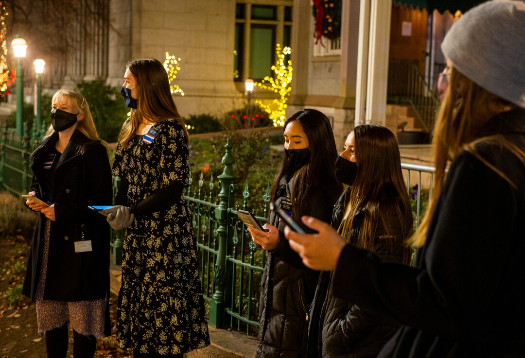 (Rick Egan | The Salt Lake Tribune)  Temple Square is closed, but sister missionaries sing Christmas carols in front of the Beehive House, in downtown Salt Lake City, Friday, Nov. 27, 2020.