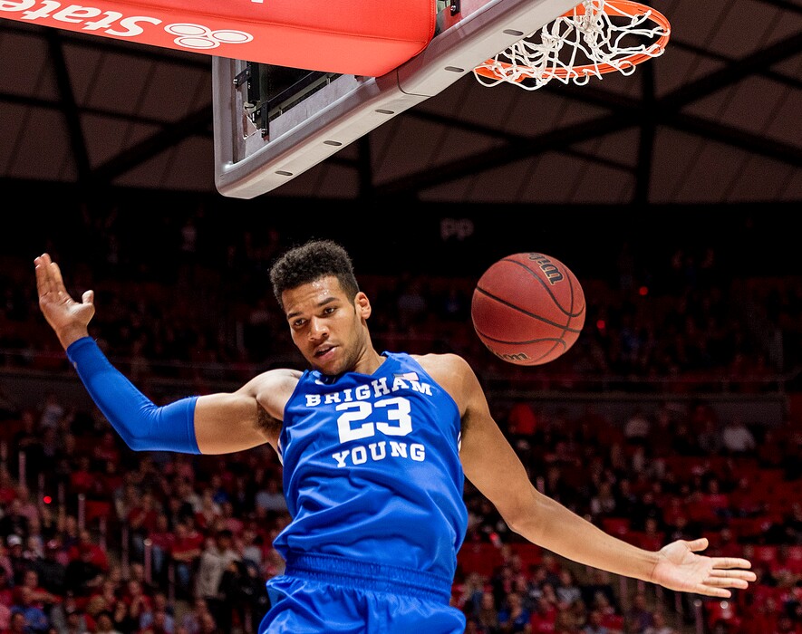 (Michael Mangum | Special to The Tribune) Brigham Young Cougars forward Yoeli Childs (23) dunks the ball during their game against the Utah Utes at the Huntsman Center in Salt Lake City on Wednesday, Dec. 4, 2019.