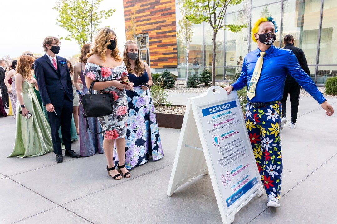 (Rick Egan | The Salt Lake Tribune)Cyprus Principal Rob McDaniel, keeps the crowd social distanced as they line-up to enter the Cyprus High school Prom, at the Viridian Event Center, on Saturday, April 24, 2021.